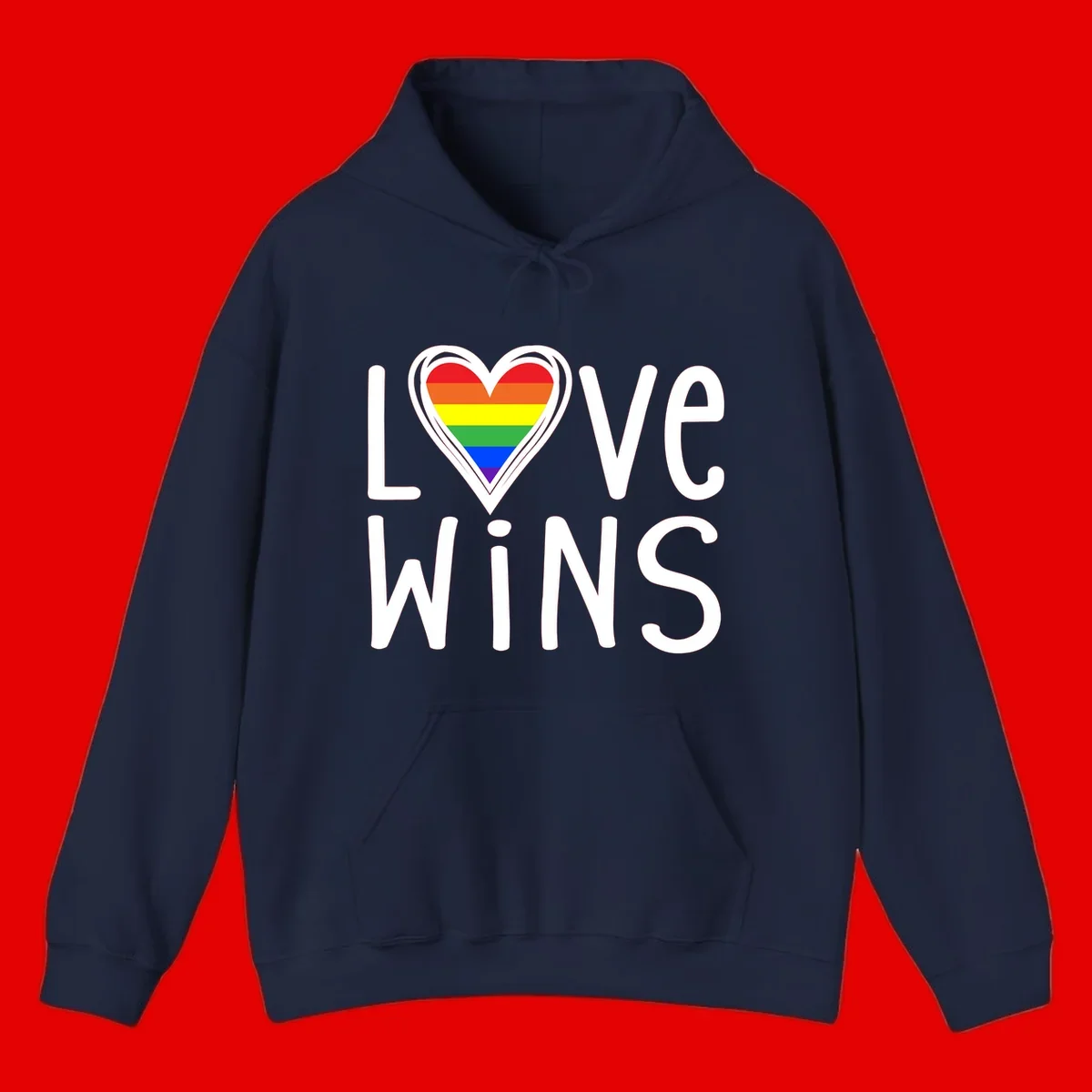 Love wins rainbow heart design with pride flag colors in white outlined heart shape and text