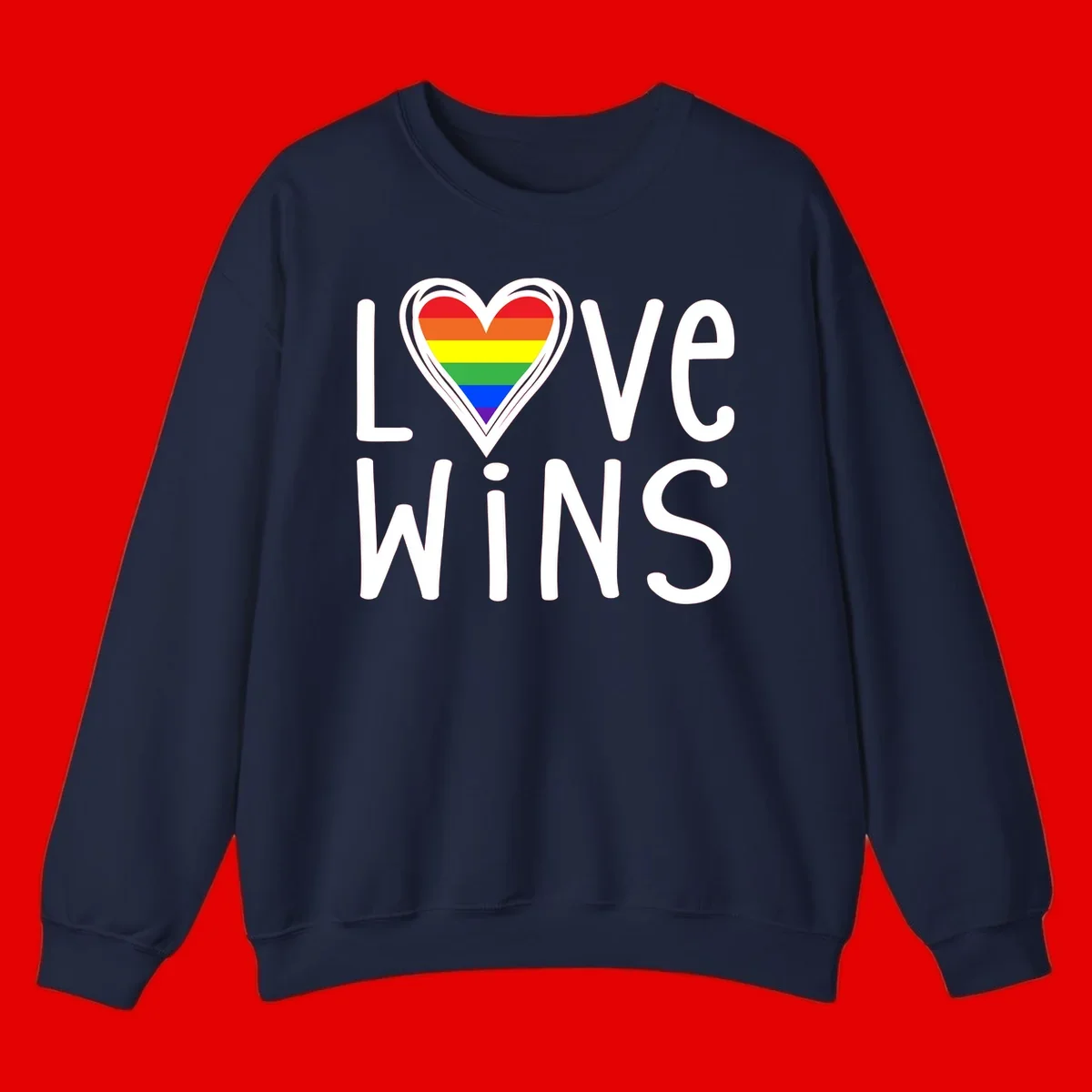Love wins rainbow heart design with pride flag colors in white outlined heart shape and text