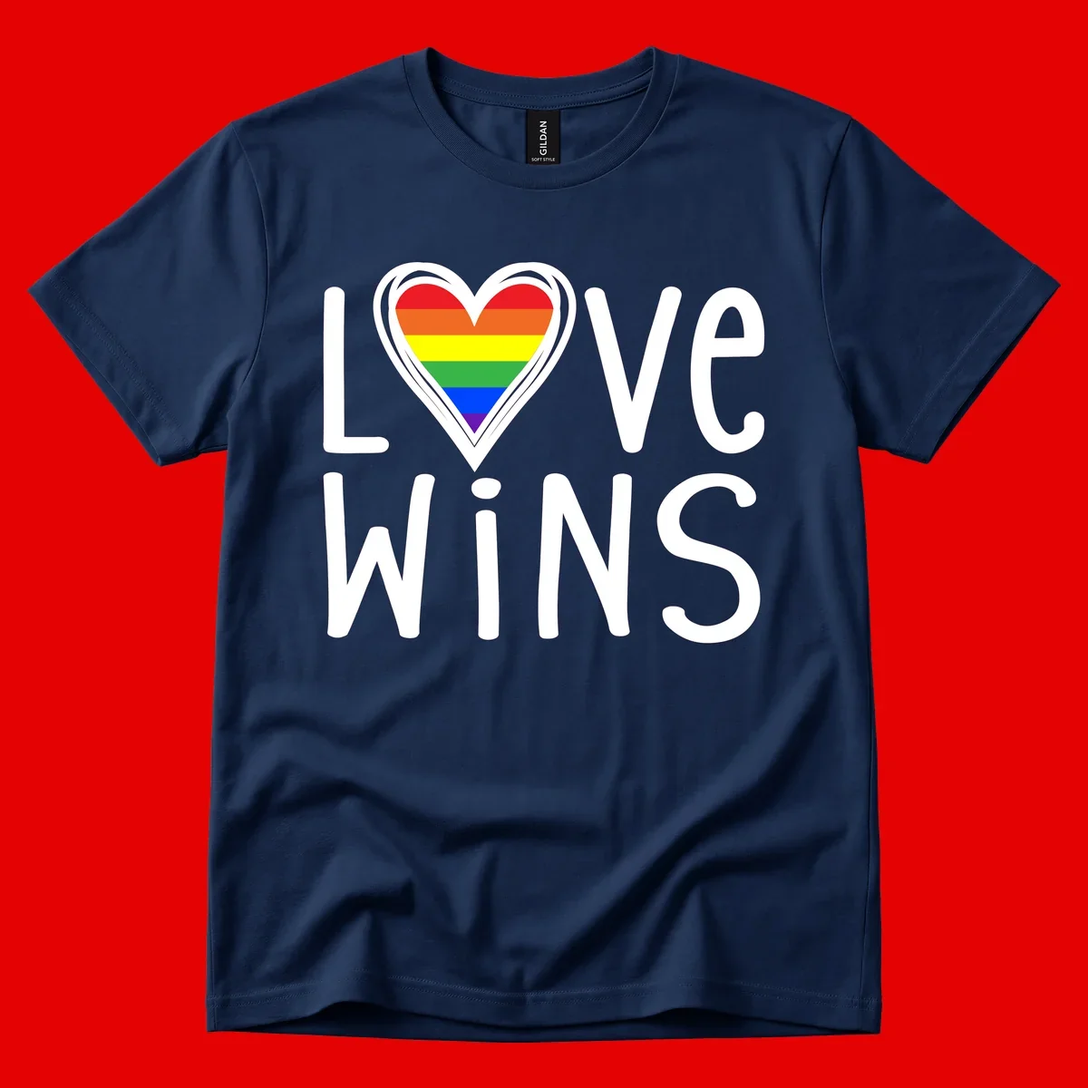 Love wins rainbow heart design with pride flag colors in white outlined heart shape and text