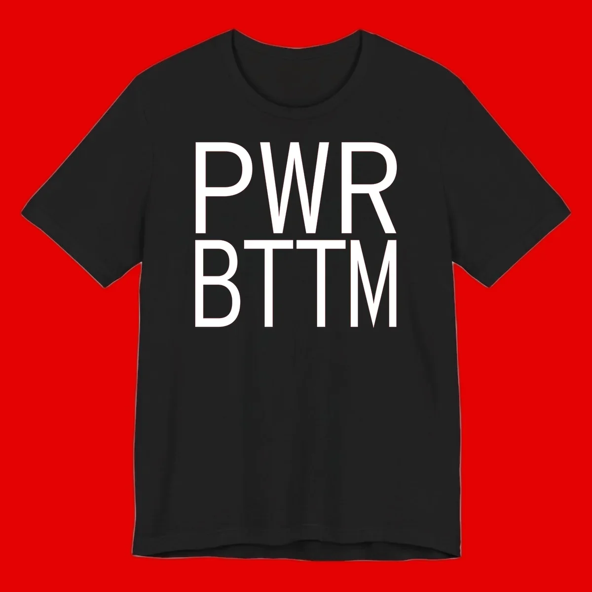 PWR BTTM pride shirt design with bold white sans-serif lettering stacked vertically on gray background
