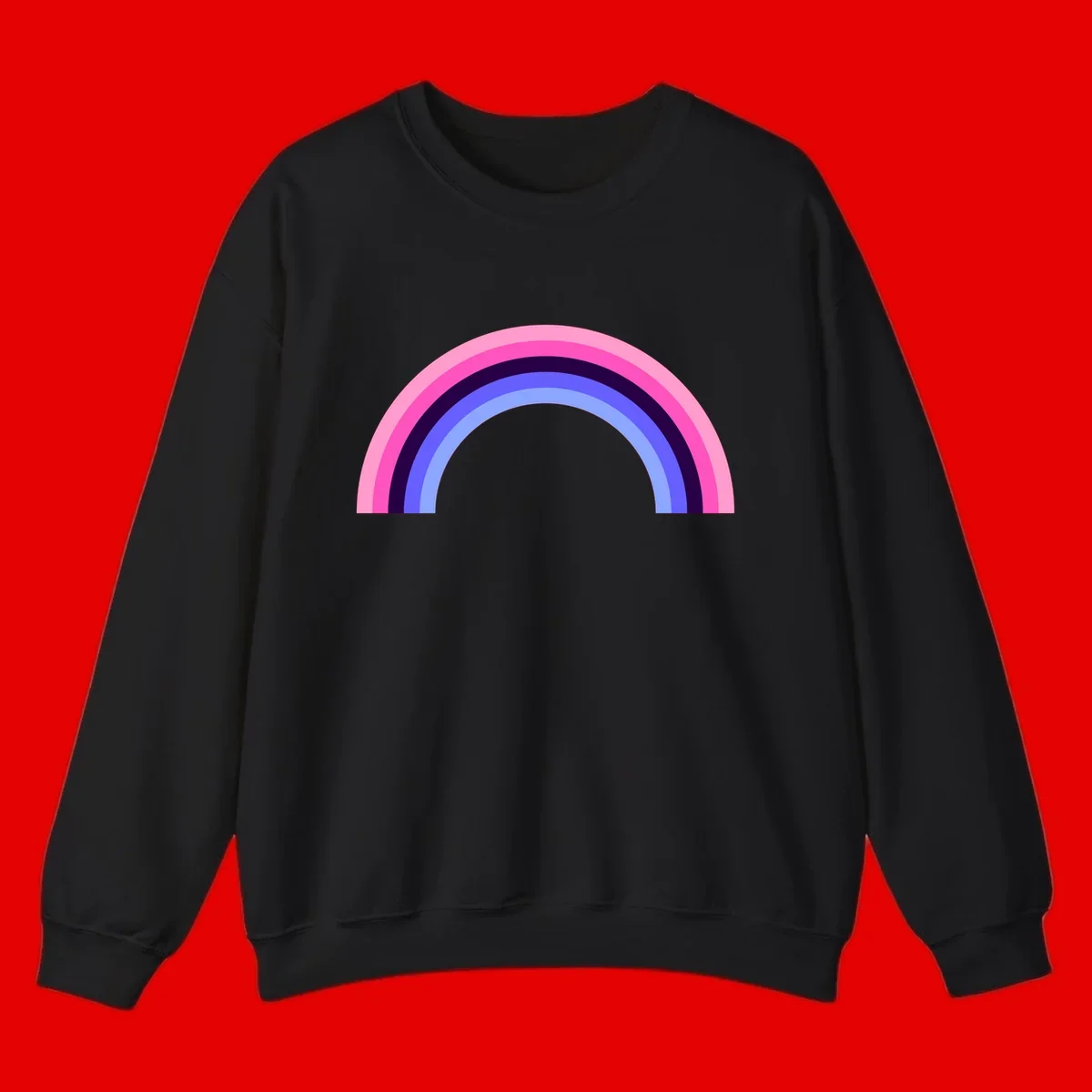 Pastel rainbow arc with five concentric colored stripes in pink, navy, blue and light blue on gray background