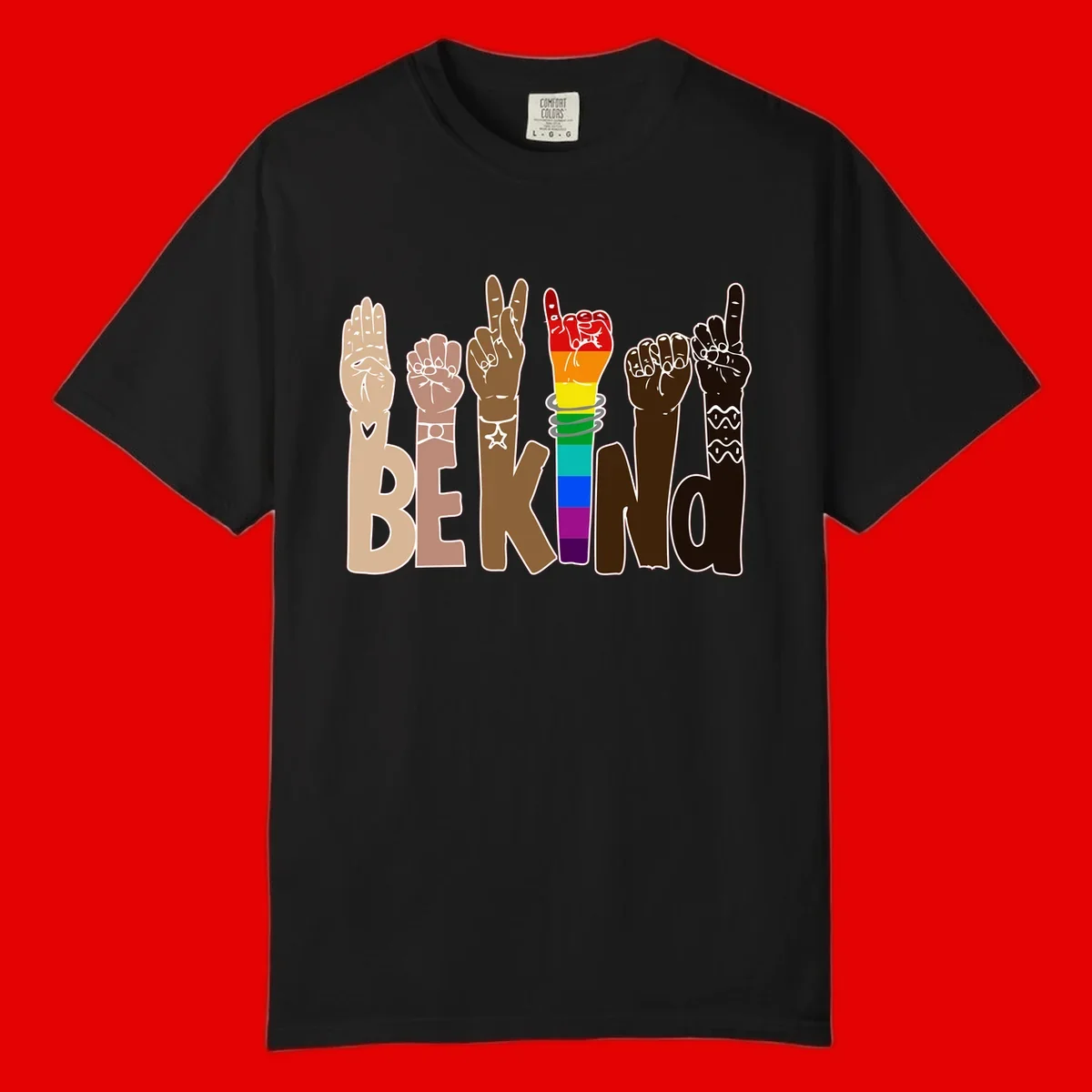Six illustrated hands in diverse skin tones displaying peace signs and fists, with center fist in rainbow pride colors and 'BE KIND' text below