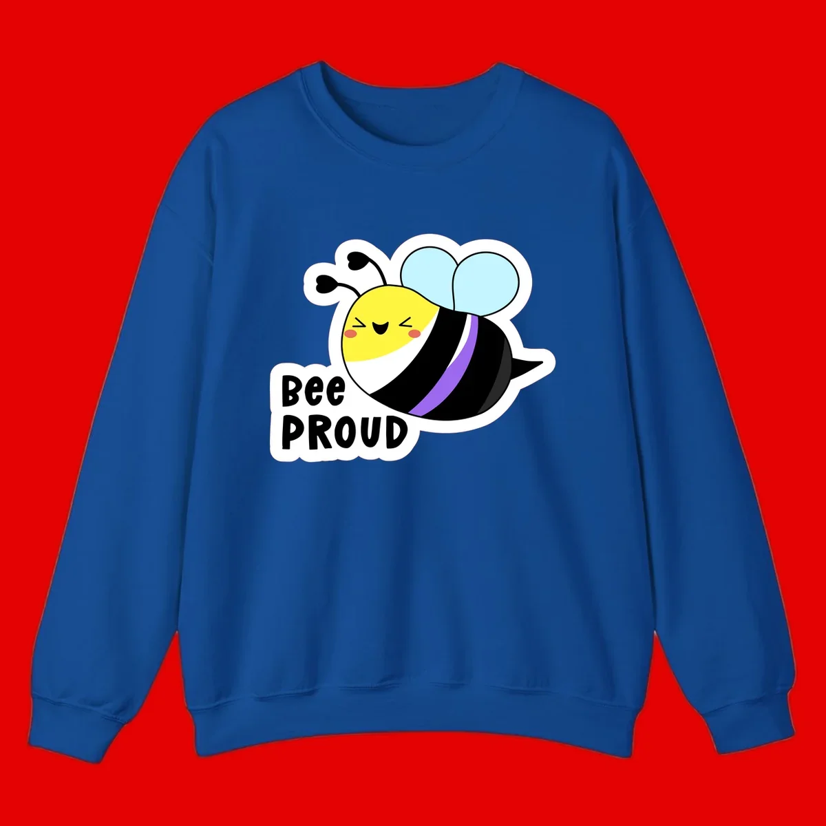 Cartoon bee with yellow head, purple-striped black body, and blue wings smiling happily with text 'BEE PROUD' below