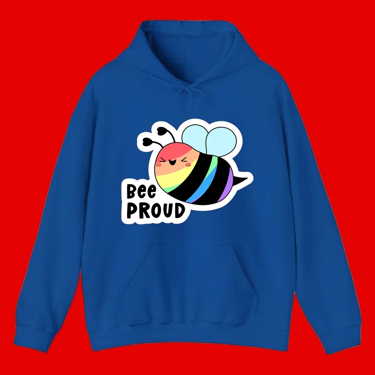 Cartoon bee with rainbow stripes and 'Bee PROUD' text celebrating LGBTQ+ pride