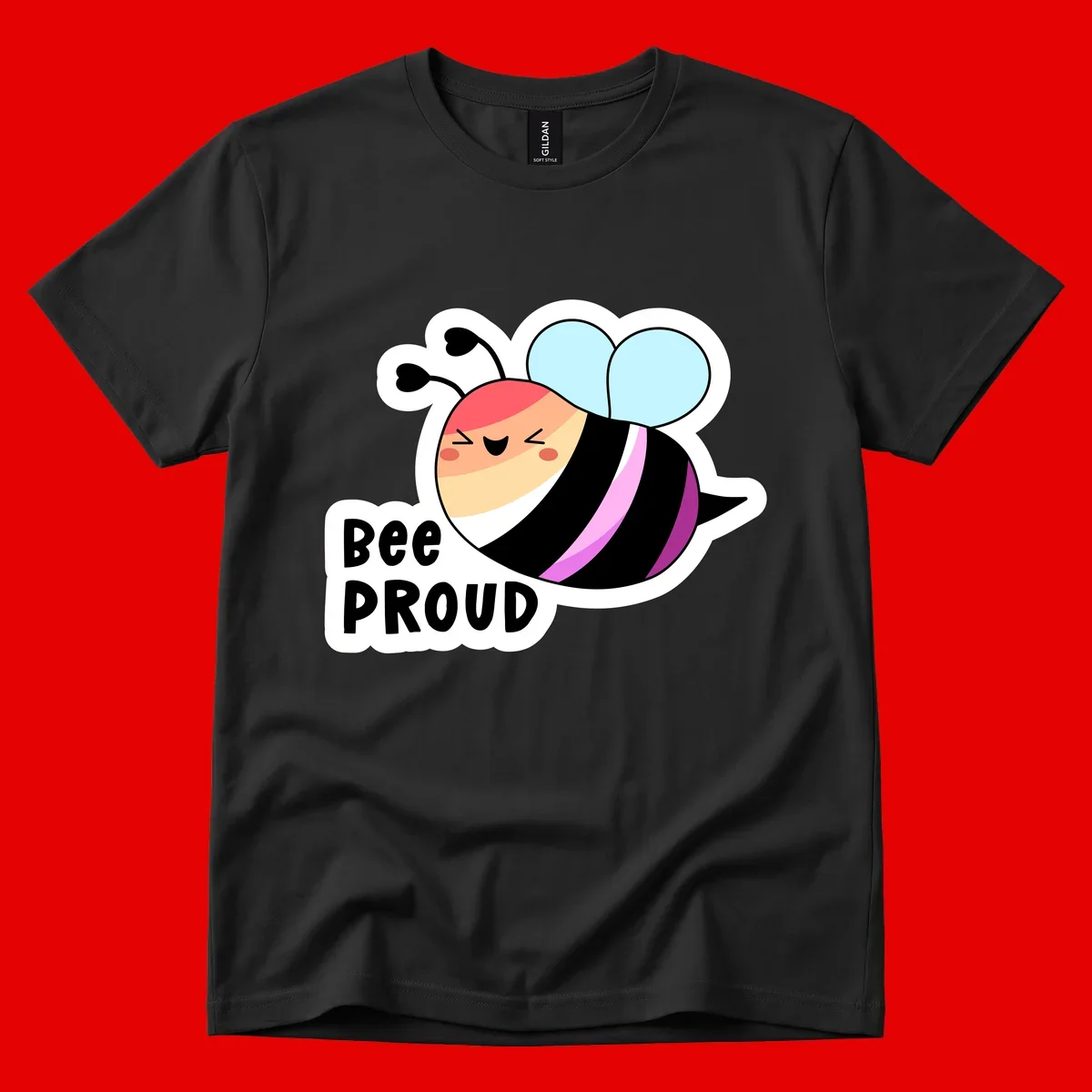 Cheerful cartoon bee with peach face and pink-striped body next to 'Bee Proud' text celebrating pride and individuality