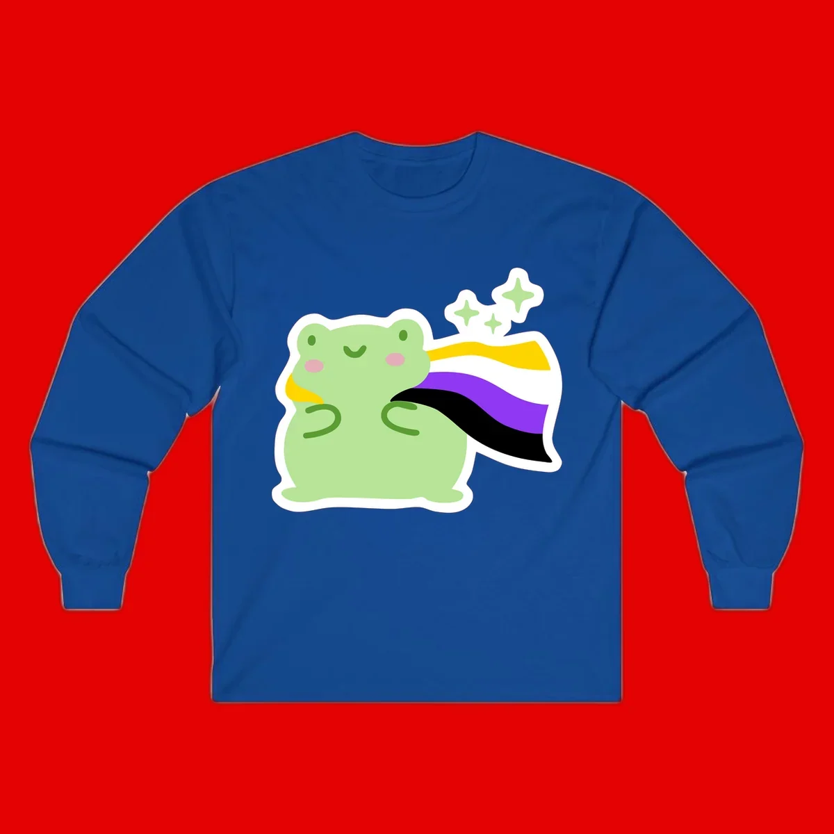 Cute green frog with pink cheeks wearing a yellow, purple, and black rainbow cape with floating sparkle stars