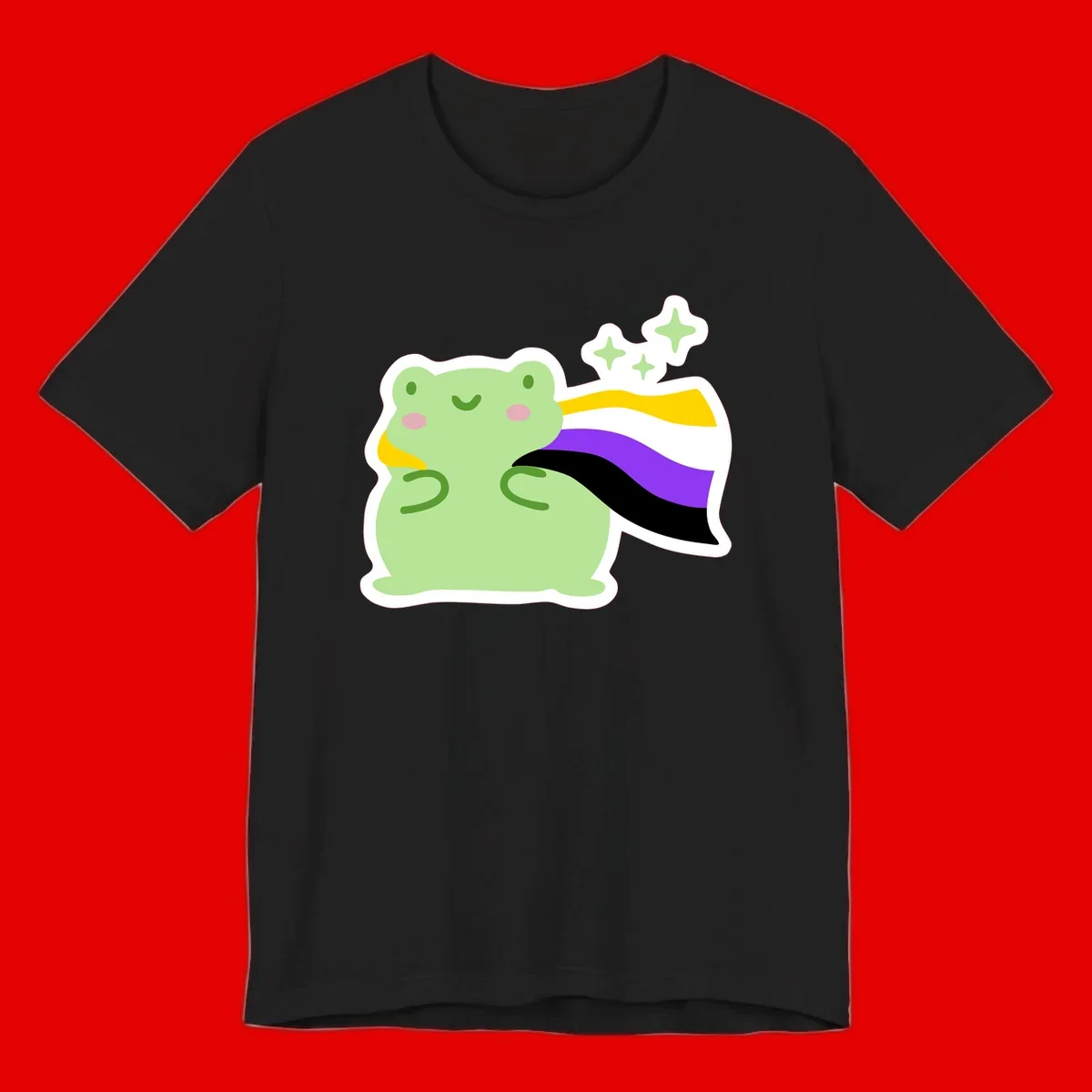 Cute green frog with pink cheeks wearing a yellow, purple, and black rainbow cape with floating sparkle stars