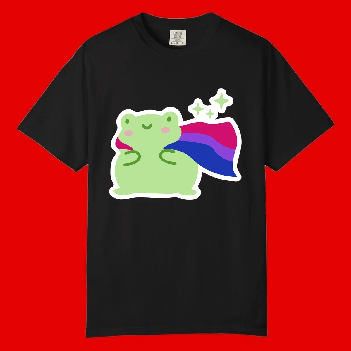 Smiling green frog wearing a flowing rainbow cape with floating sparkles, pride-frog-cape design illustration