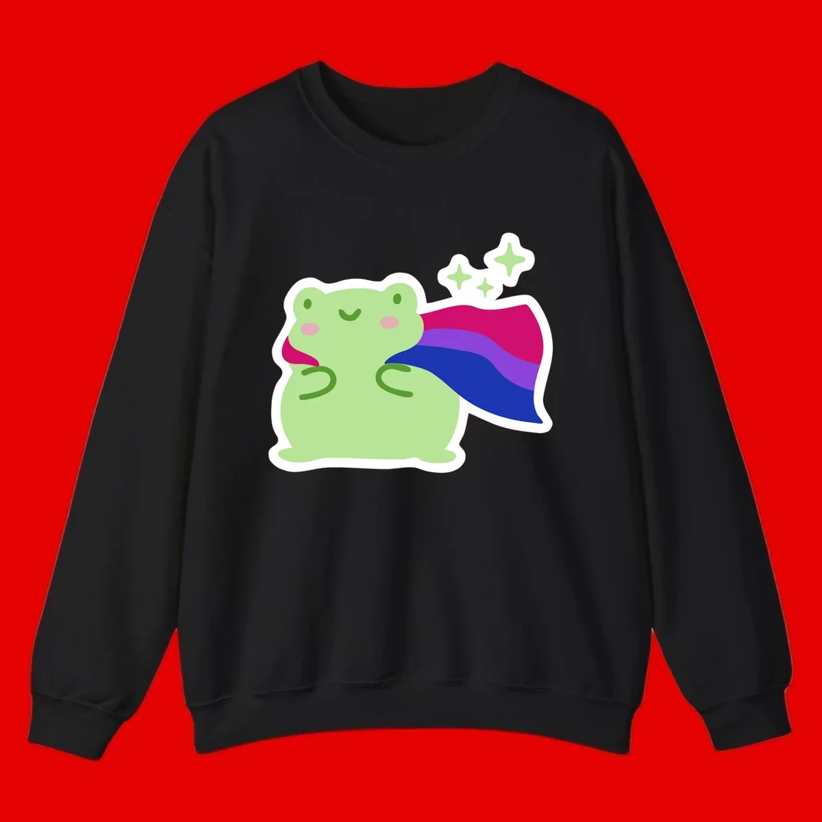 Smiling green frog wearing a flowing rainbow cape with floating sparkles, pride-frog-cape design illustration