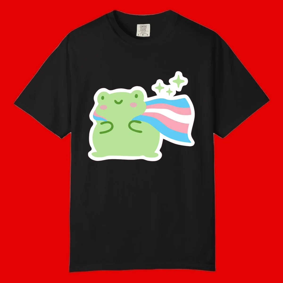Cheerful green frog with sparkles wearing a magical pink and blue striped cape
