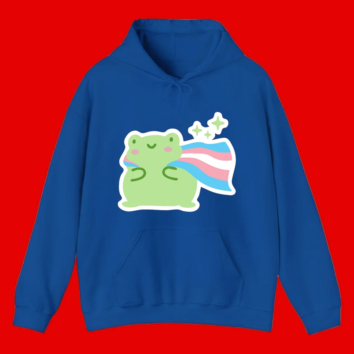 Cheerful green frog with sparkles wearing a magical pink and blue striped cape