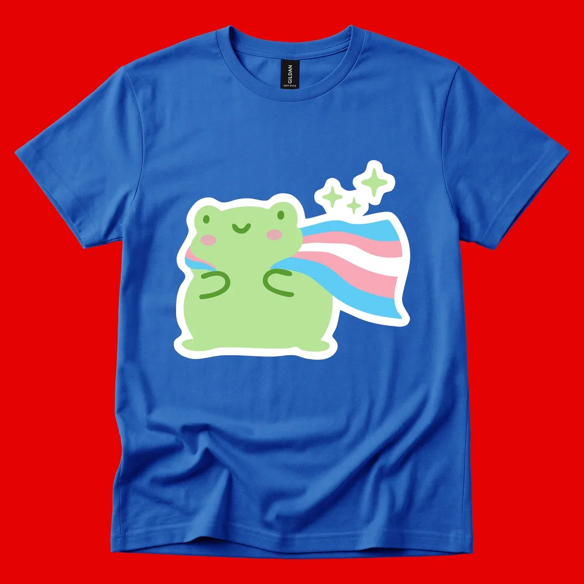 Cheerful green frog with sparkles wearing a magical pink and blue striped cape