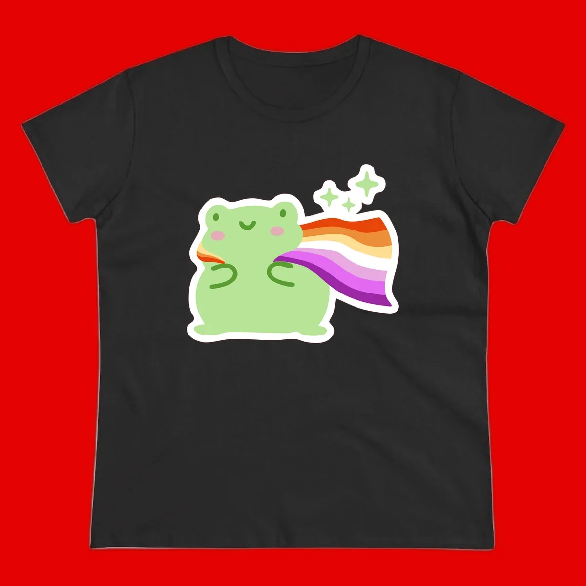 Cute green frog with pink cheeks wearing a rainbow pride cape, surrounded by sparkle stars