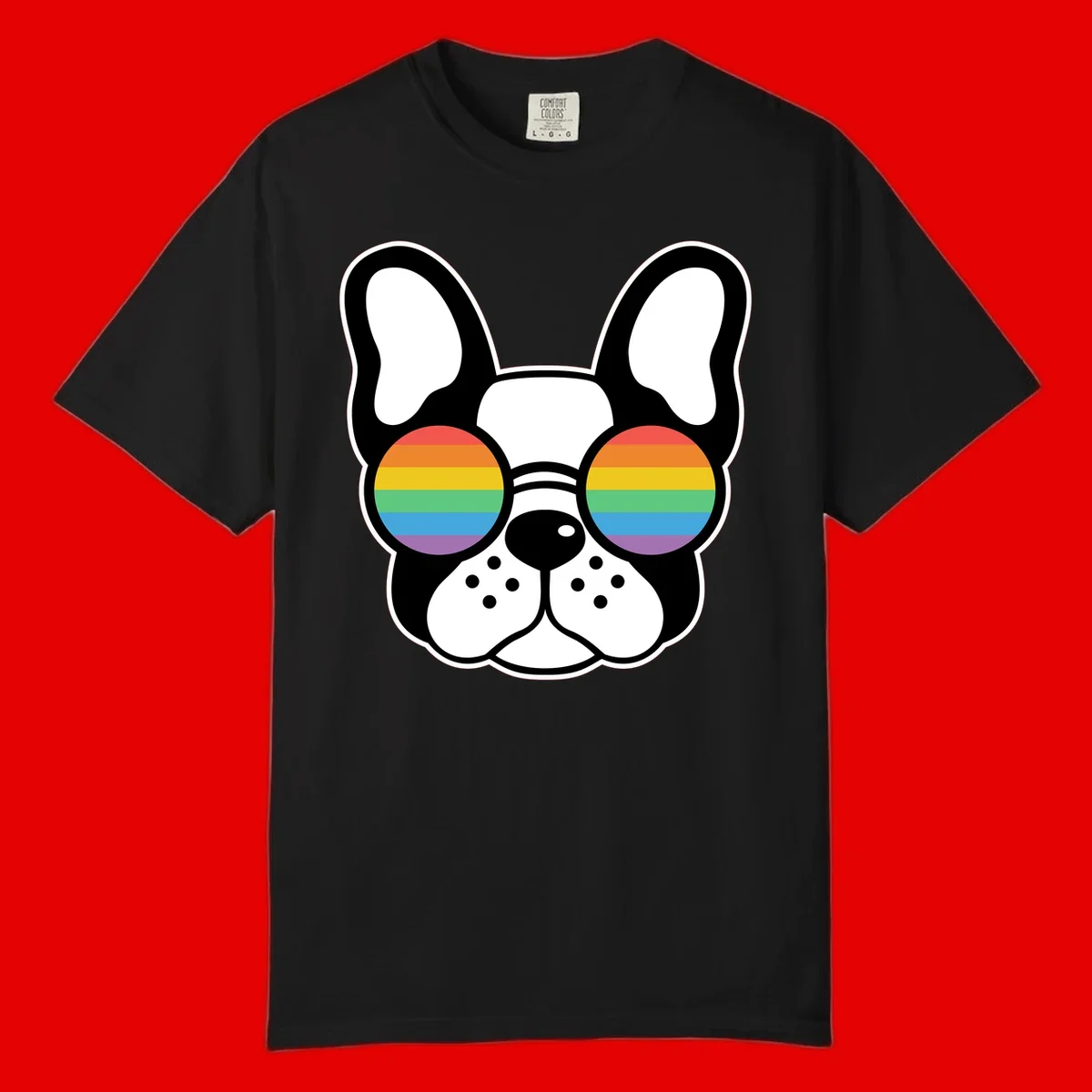 Black and white French Bulldog wearing round sunglasses with rainbow pride flag stripes in red, orange, yellow, green, blue, and purple.