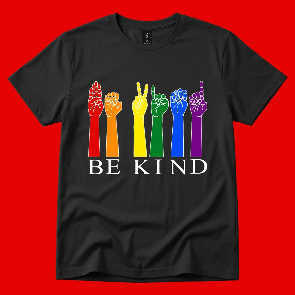 Six rainbow-colored raised hands in red, orange, yellow, green, blue, and purple with white line details and 'BE KIND' text below