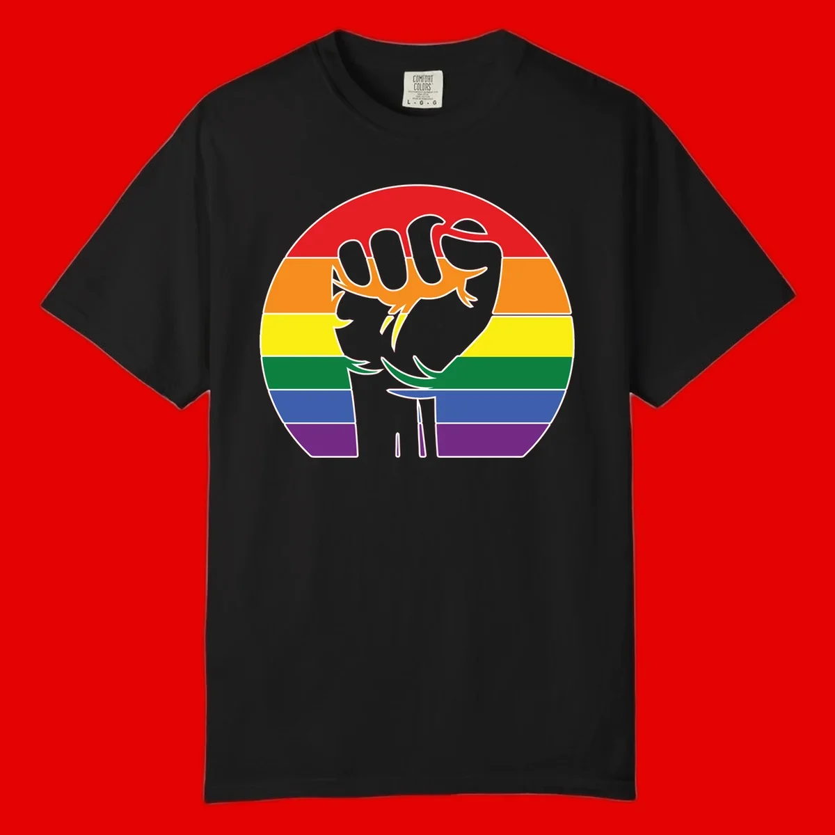 Gray dachshund with elongated body stretching across circular rainbow pride flag stripes in red, orange, yellow, green, blue, and purple