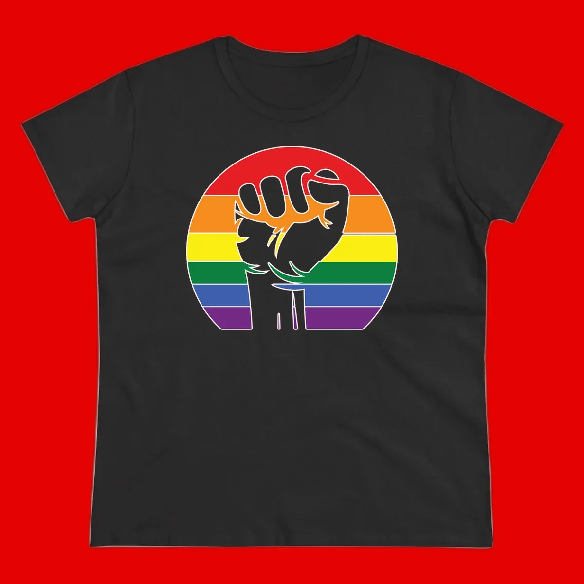 Gray dachshund with elongated body stretching across circular rainbow pride flag stripes in red, orange, yellow, green, blue, and purple