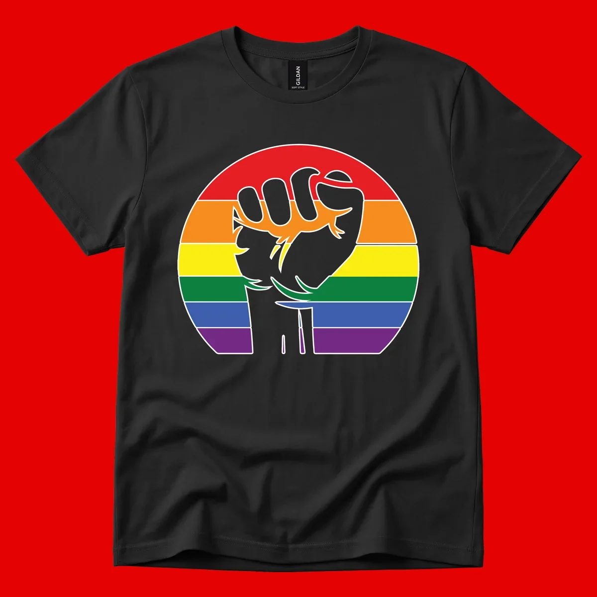 Gray dachshund with elongated body stretching across circular rainbow pride flag stripes in red, orange, yellow, green, blue, and purple