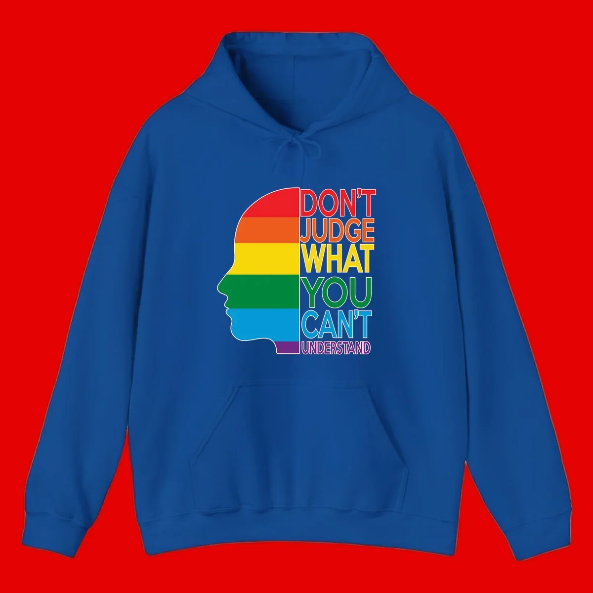 Rainbow-striped head silhouette with text 'Don't Judge What You Can't Understand' promoting LGBTQ acceptance and inclusion