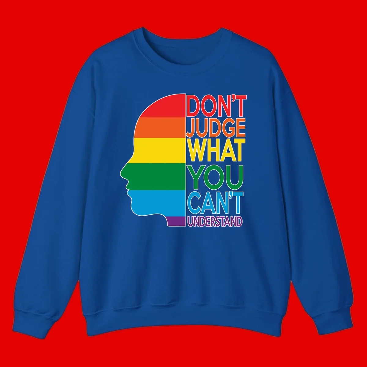 Rainbow-striped head silhouette with text 'Don't Judge What You Can't Understand' promoting LGBTQ acceptance and inclusion