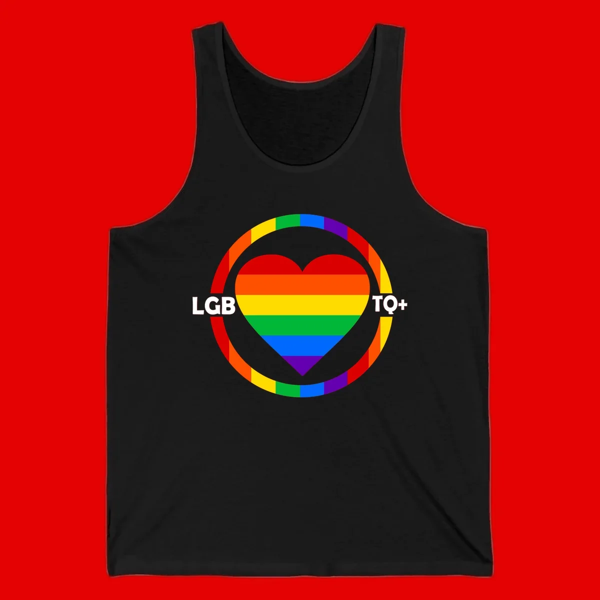 Rainbow heart with LGB TO+ text in concentric pride circles on gray background