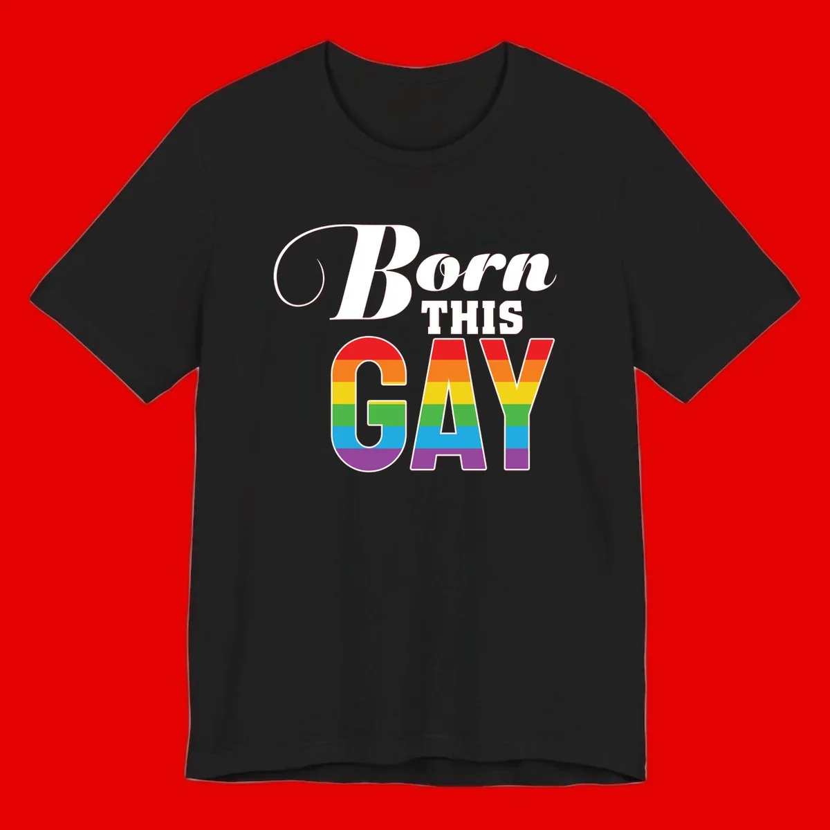 Born This Gay pride design with rainbow flag stripes filling large letters on gray background