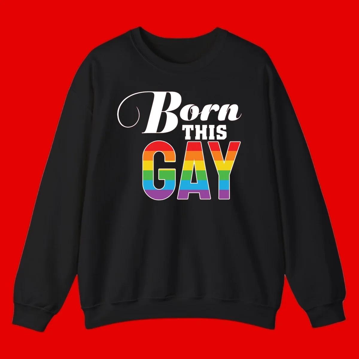 Born This Gay pride design with rainbow flag stripes filling large letters on gray background