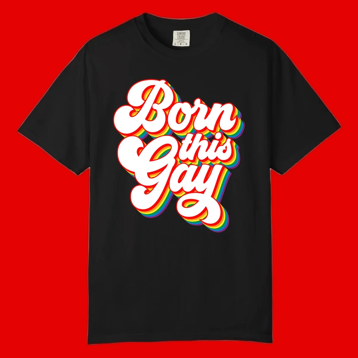 Born this gay pride design with white text outlined in red and filled with rainbow stripes on gray background