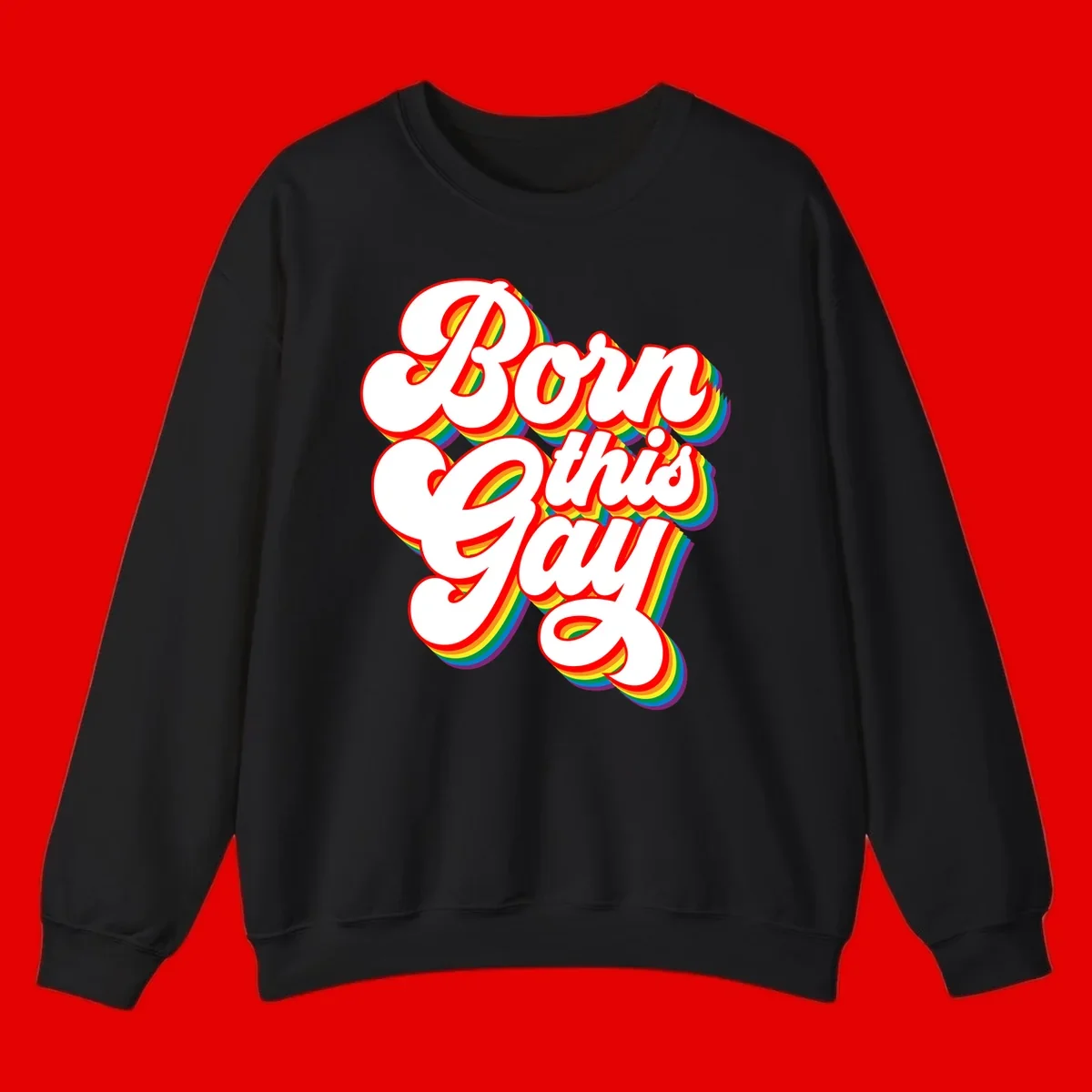 Born this gay pride design with white text outlined in red and filled with rainbow stripes on gray background