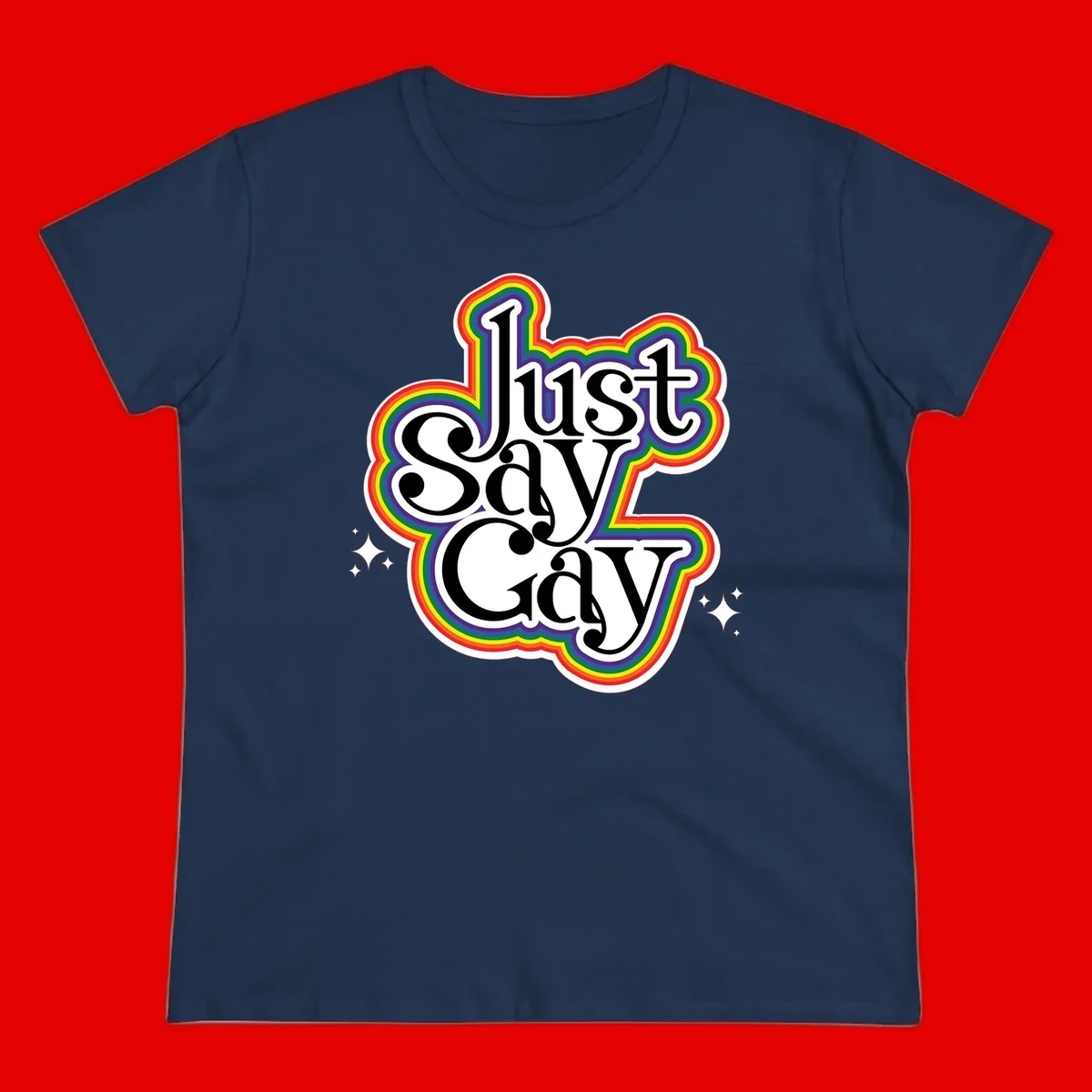 Just Say Gay Pride design with bold black text surrounded by vibrant rainbow border and sparkle accents on gray background