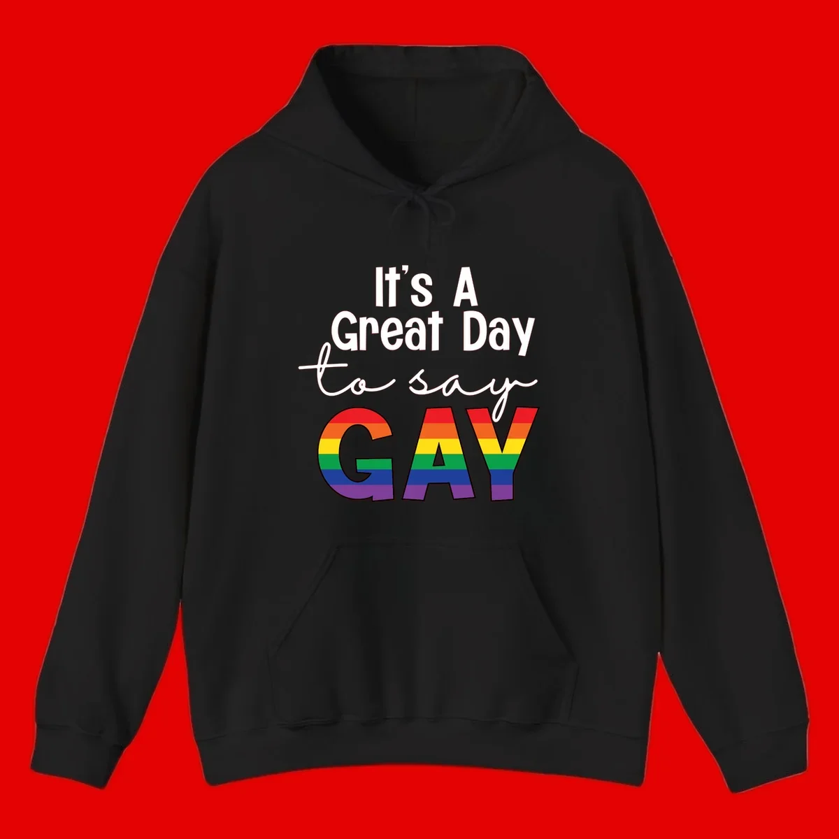 Gray background with white text reading 'It's A Great Day To Say' and the word 'GAY' in large letters filled with rainbow pride flag stripes