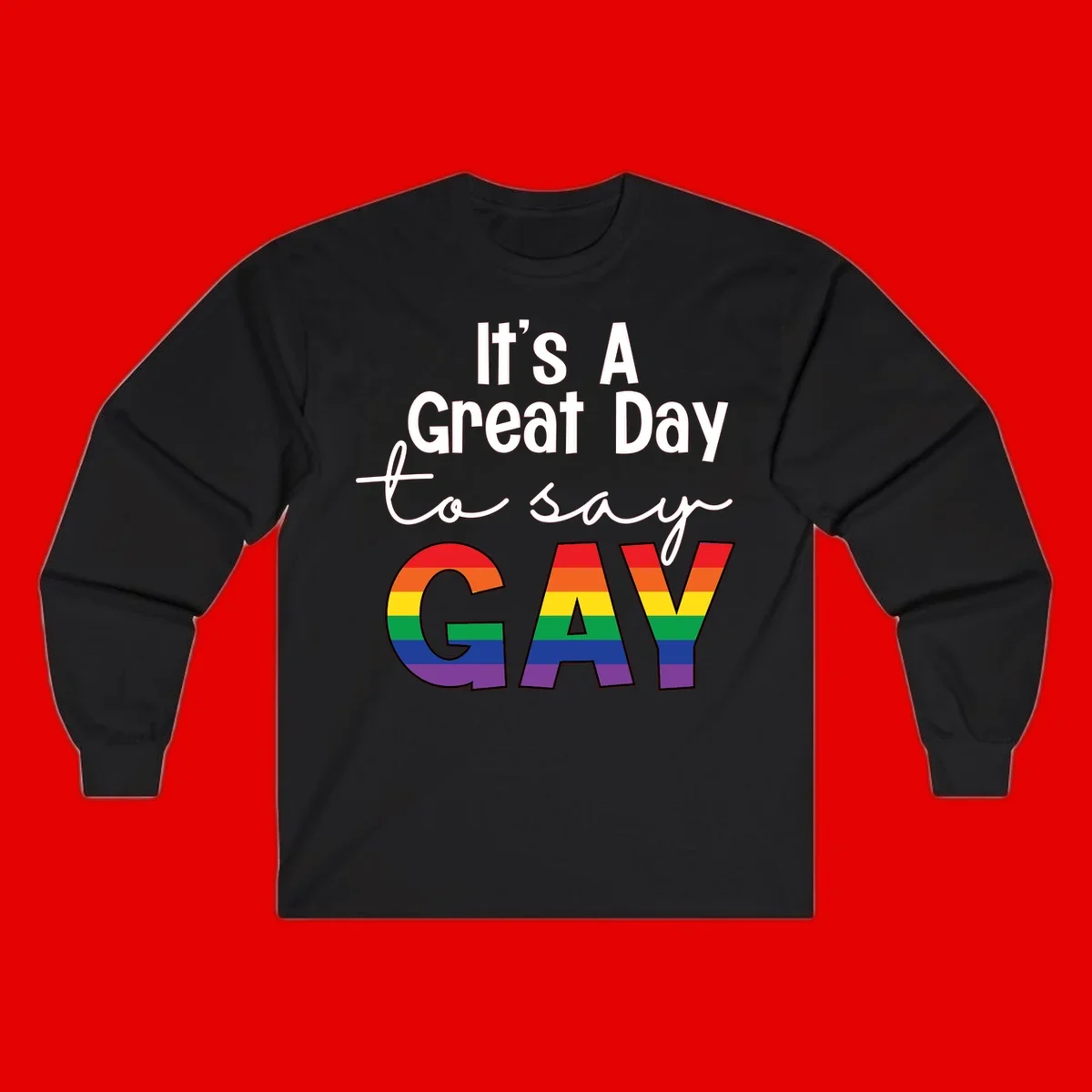Gray background with white text reading 'It's A Great Day To Say' and the word 'GAY' in large letters filled with rainbow pride flag stripes