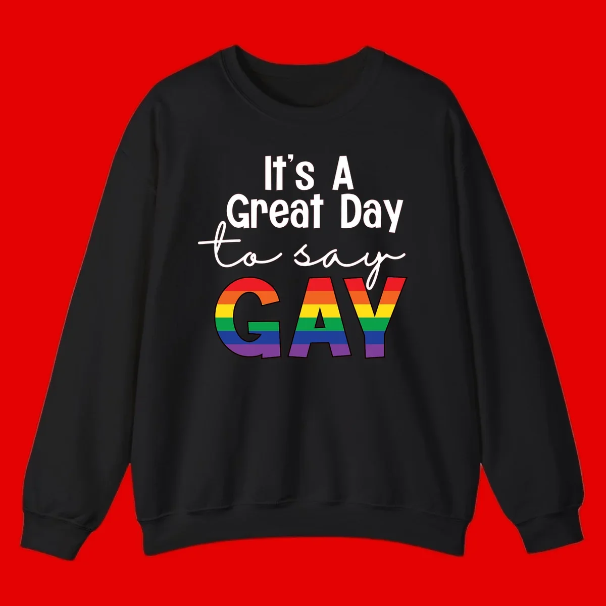 Gray background with white text reading 'It's A Great Day To Say' and the word 'GAY' in large letters filled with rainbow pride flag stripes