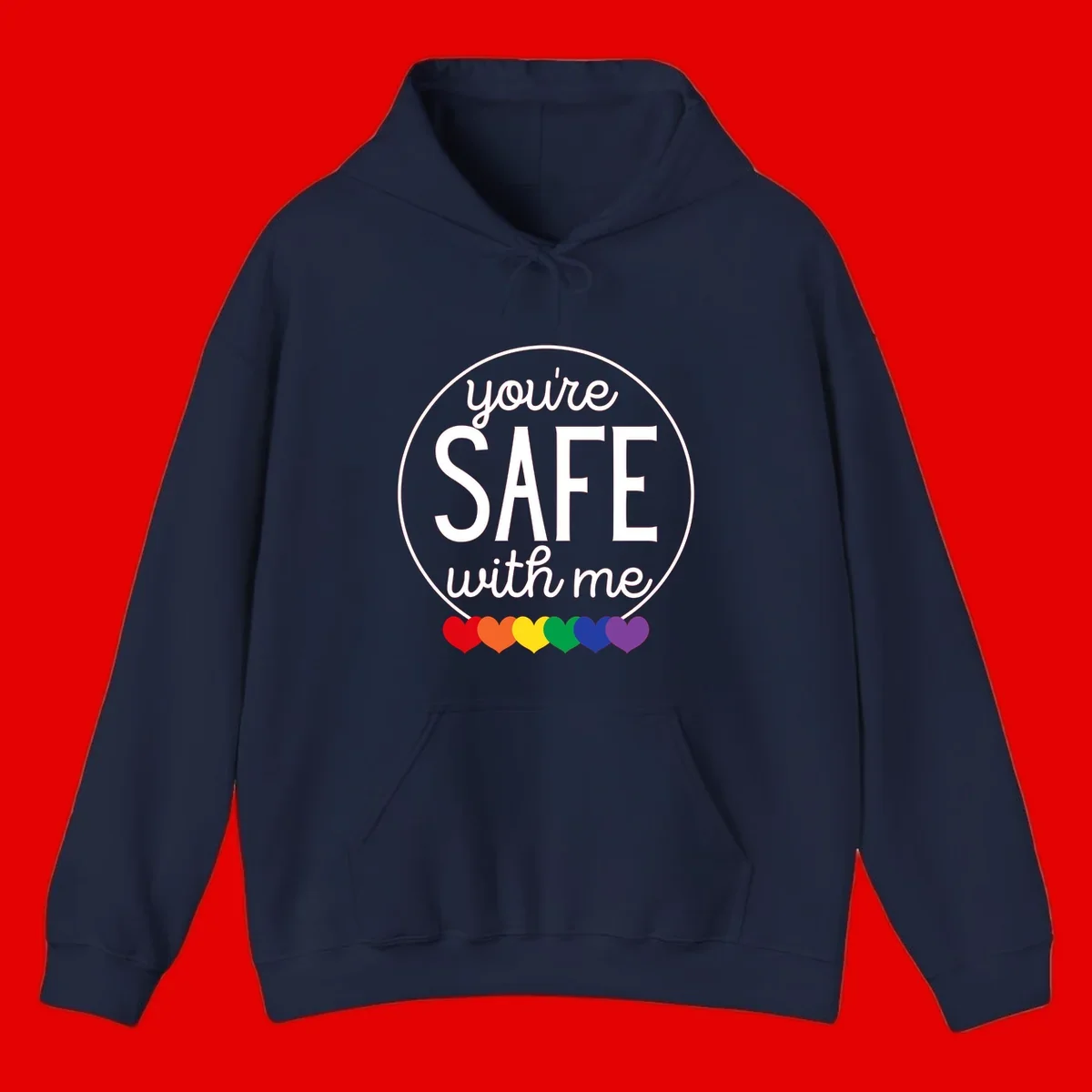 Circular badge with 'you're SAFE with me' text and rainbow pride hearts, promoting inclusive safe space message