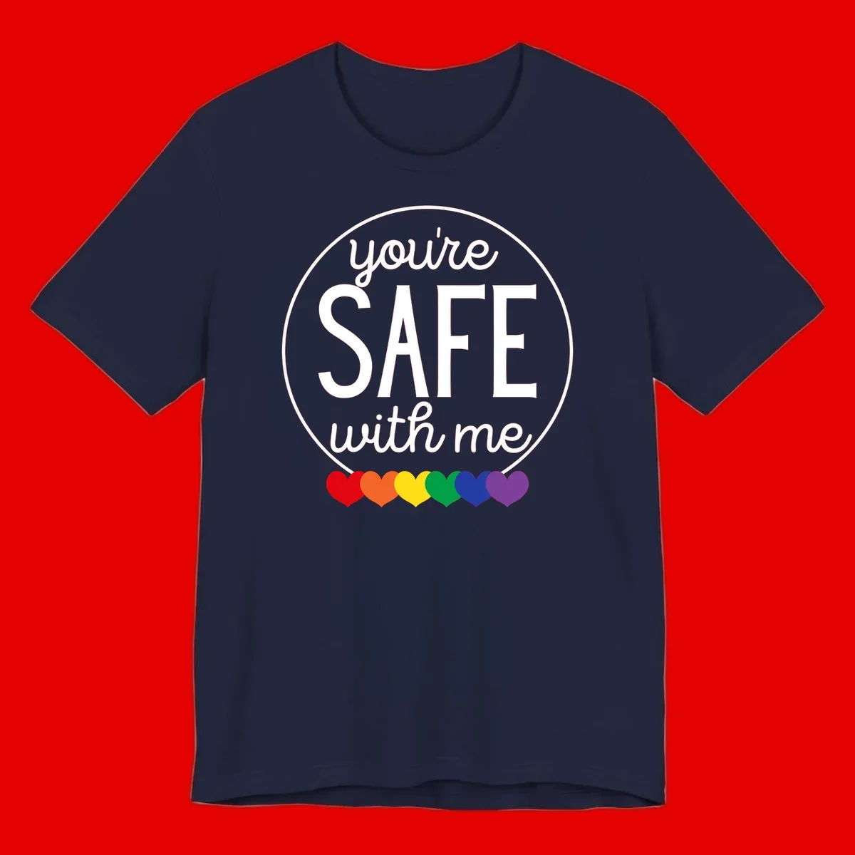 Circular badge with 'you're SAFE with me' text and rainbow pride hearts, promoting inclusive safe space message