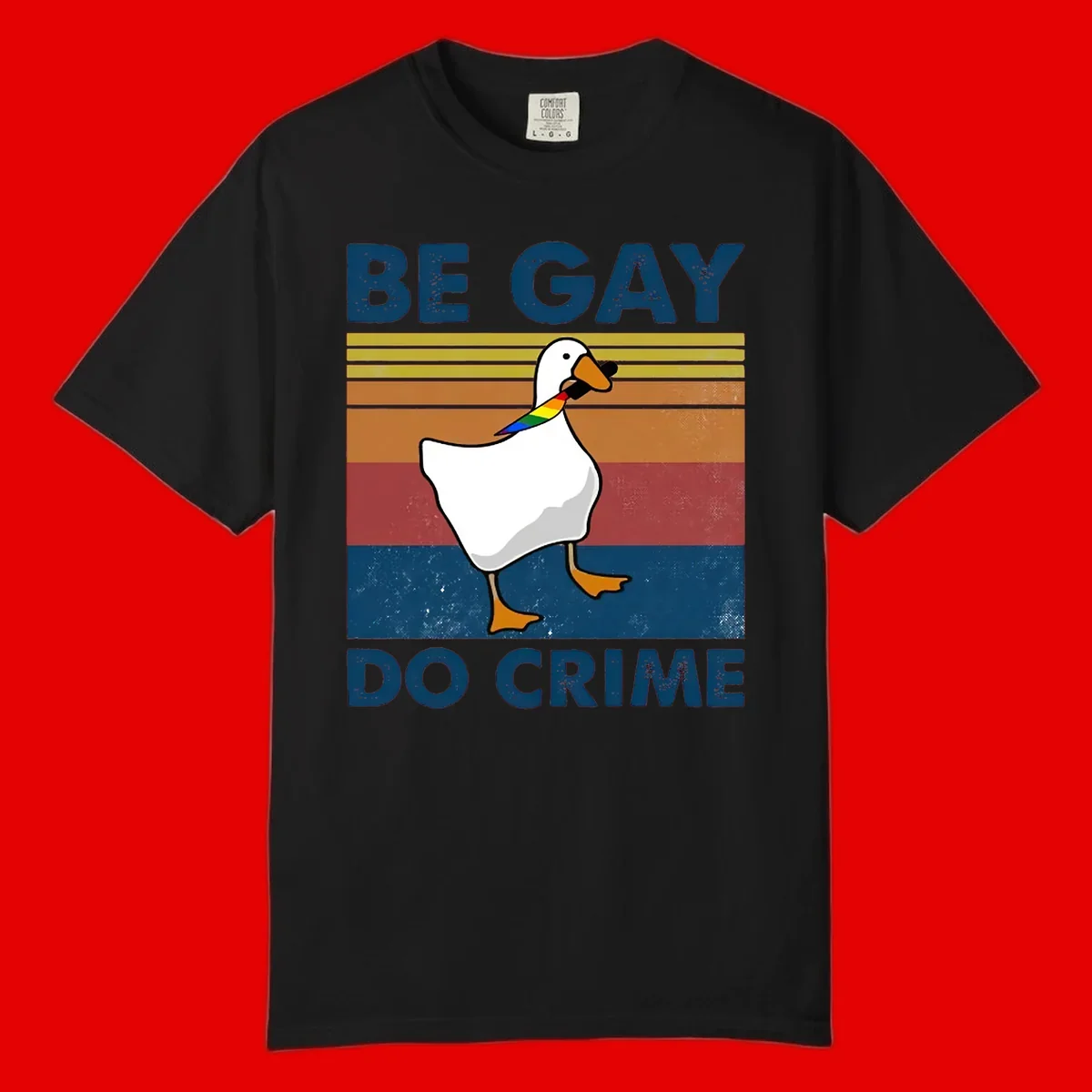 White duck with rainbow wing on retro striped background with 'Be Gay Do Crime' text, pride design