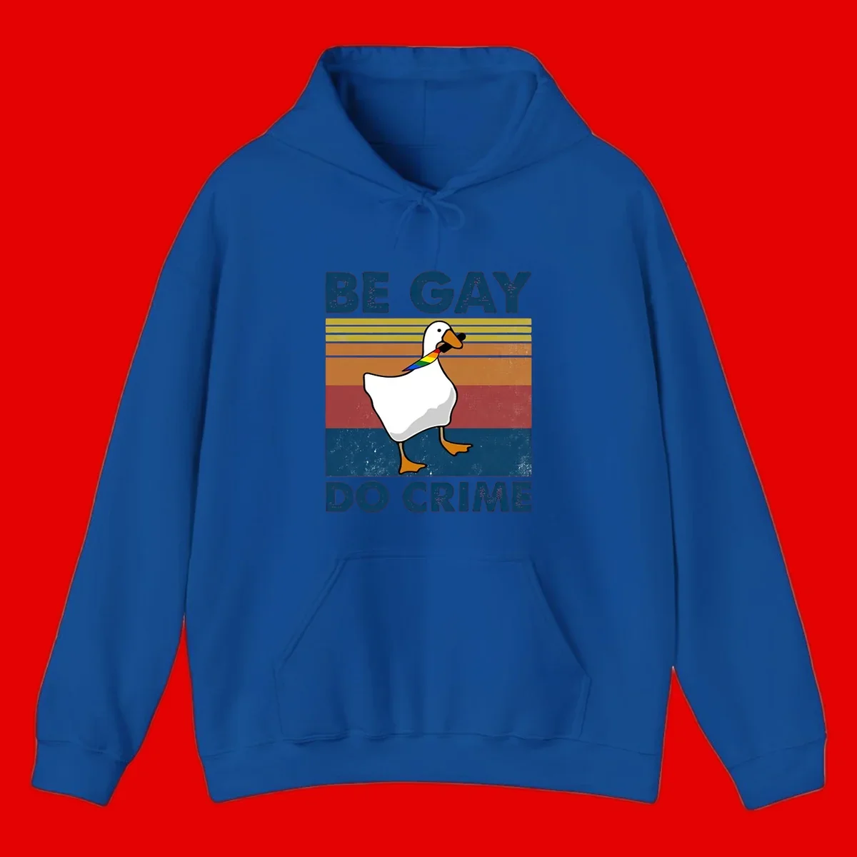 White duck with rainbow wing on retro striped background with 'Be Gay Do Crime' text, pride design