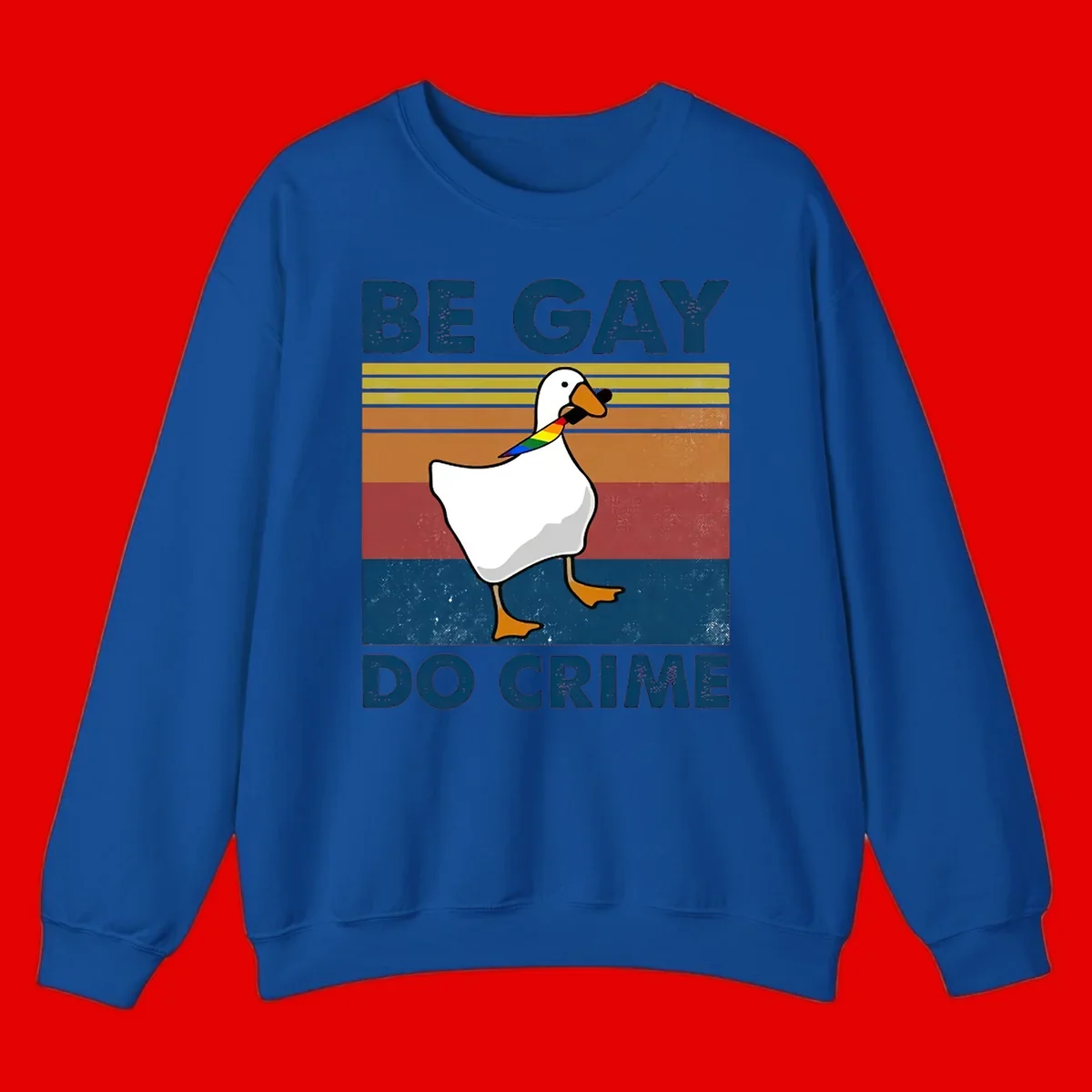 White duck with rainbow wing on retro striped background with 'Be Gay Do Crime' text, pride design