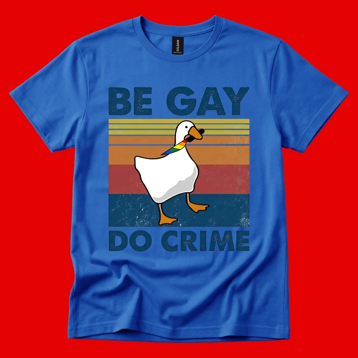 White duck with rainbow wing on retro striped background with 'Be Gay Do Crime' text, pride design