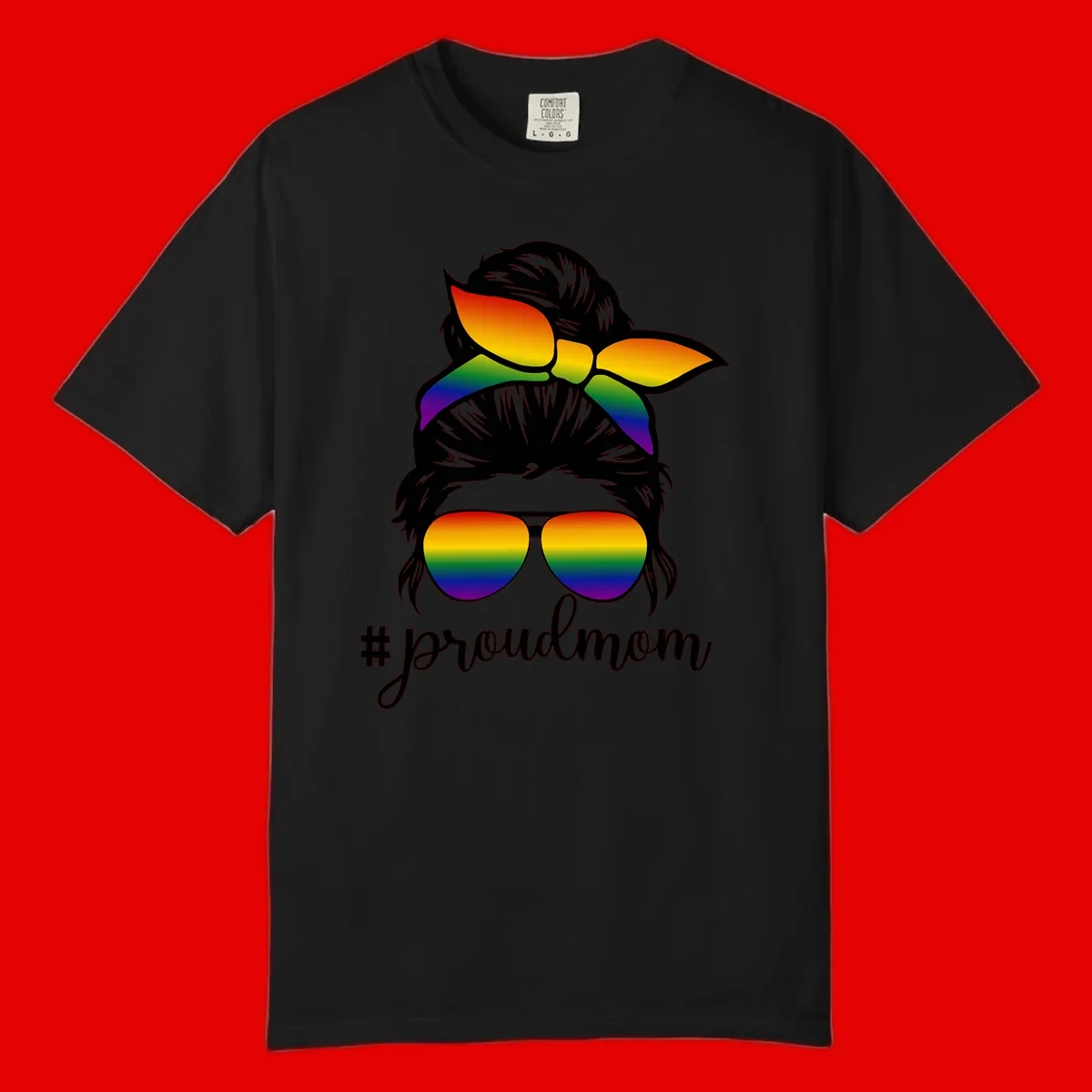 Illustration of a woman with black hair wearing rainbow bow, sunglasses, and lips with #proudmom text celebrating LGBTQ pride
