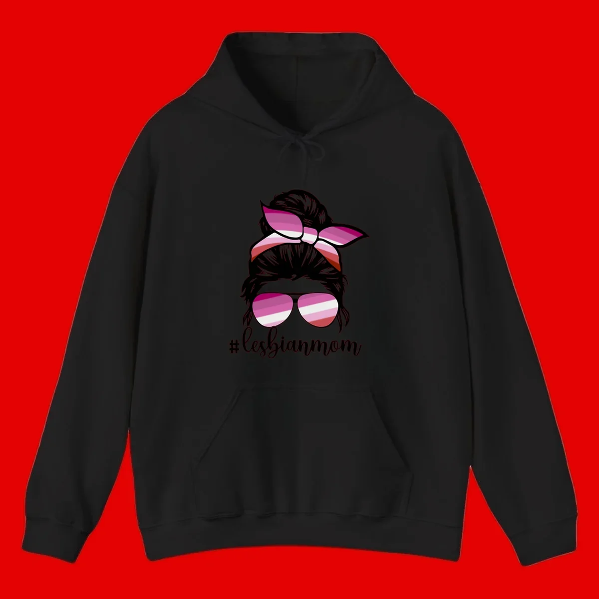 Illustration of a woman with black hair, pink bow, and aviator sunglasses featuring lesbian pride flag stripes with #lesbianmom text