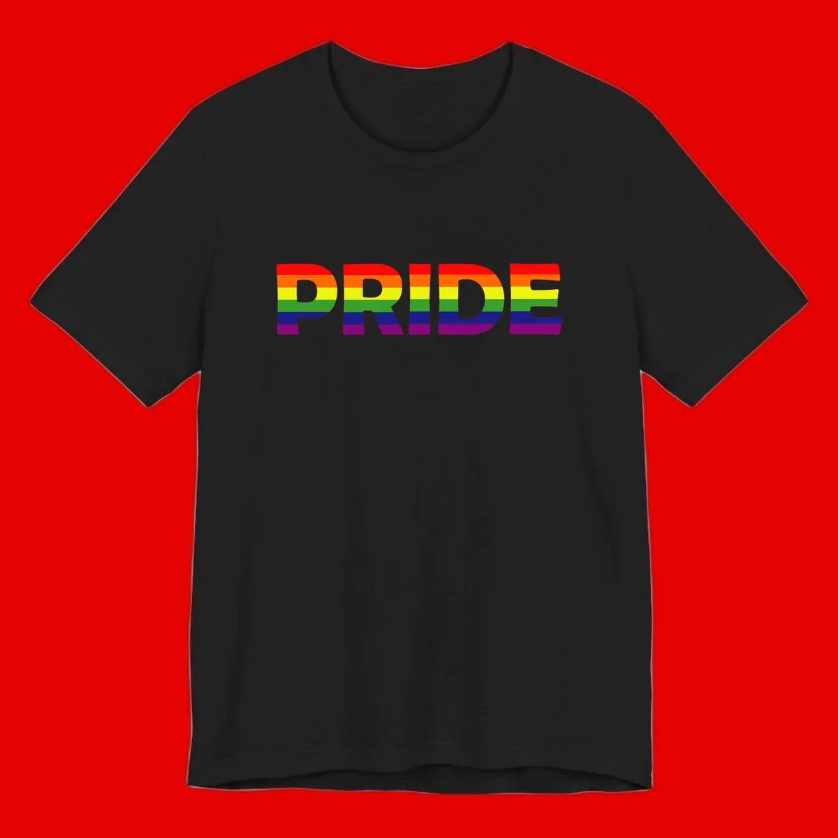 The word PRIDE in large letters filled with rainbow pride flag stripes on gray background