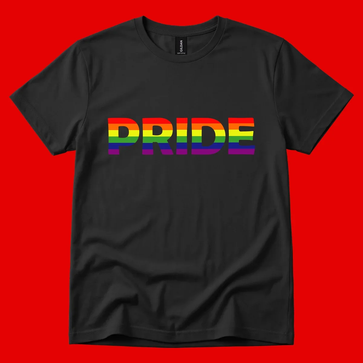 The word PRIDE in large letters filled with rainbow pride flag stripes on gray background