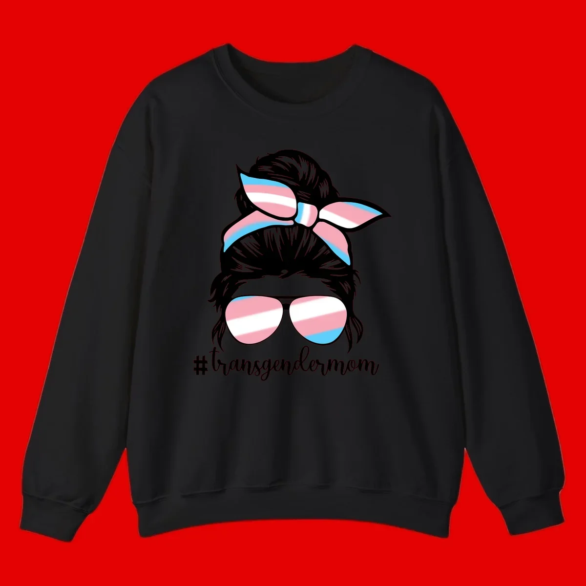 Stylized portrait with black hair, cat-eye sunglasses and bow in transgender flag colors, #transgendermom text below