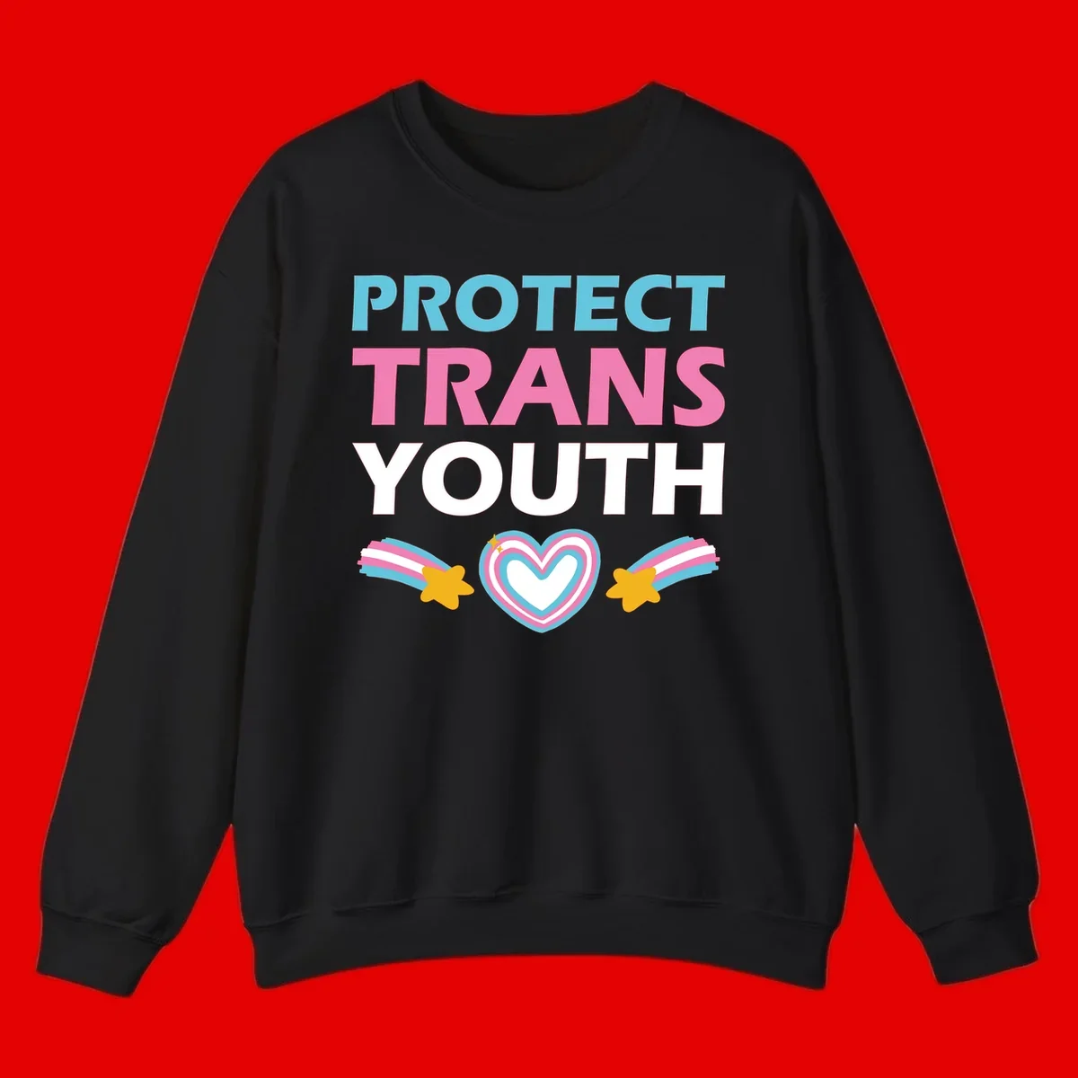 Protect trans youth design with cyan, pink, and white text, rainbow heart, and gold stars on gray background