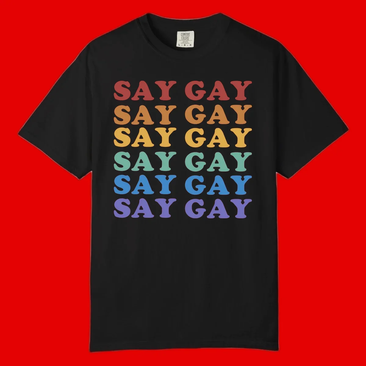 Repeating 'SAY GAY' text in rainbow colors from red to purple on gray background, pride statement design