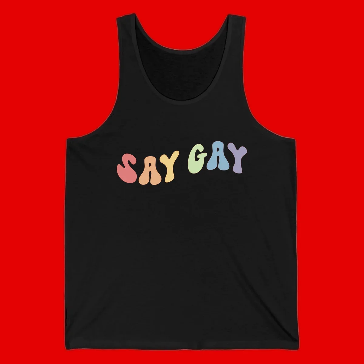 Colorful bubble letters spelling SAY GAY in rainbow pride colors: red, peach, yellow, green, blue, and purple on gray background