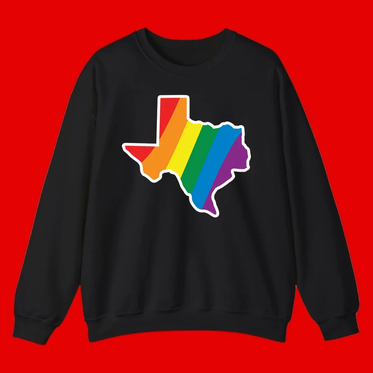 Texas state map filled with diagonal rainbow pride flag stripes in red, orange, yellow, green, blue, and purple with white border