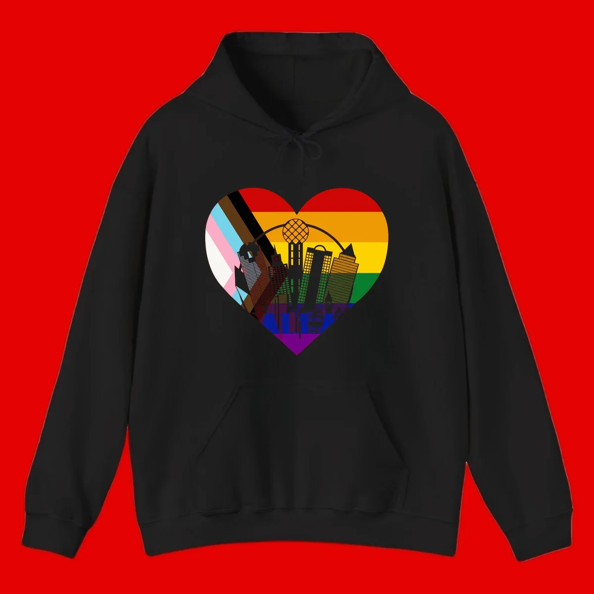 Heart-shaped design with rainbow pride flag and gray city skyline featuring skyscrapers and urban architecture