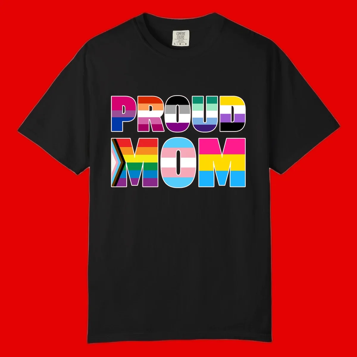 Colorful 'PROUD' letters filled with various pride flags including rainbow, trans, progress pride, and intersex symbols on gray background